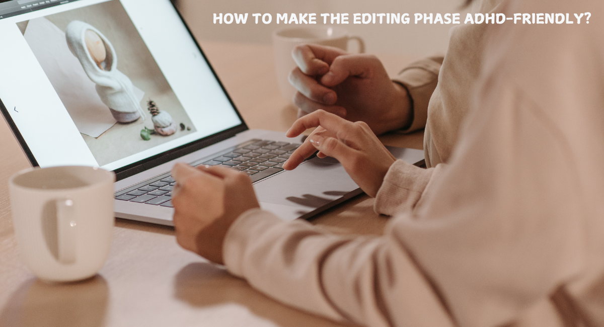 someone working on their laptop editing something on Canva 