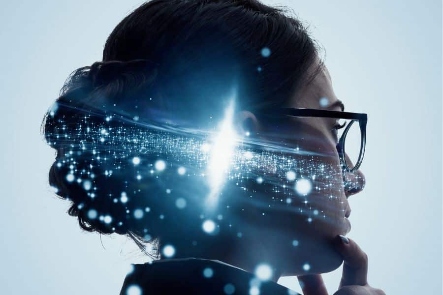 a woman with glasses and a glowing light coming out of her head